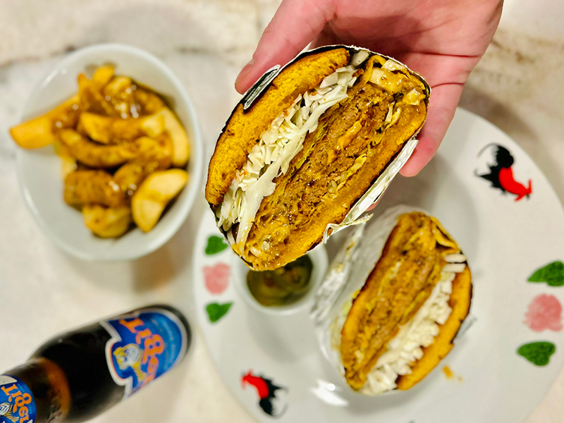 A plate of food representing the cuisine of the restaurant Kampar a Philadelphia restaurant participating in the Philadelphia Inquirer Food festival, November 15th, 2025, at the Fillmore.