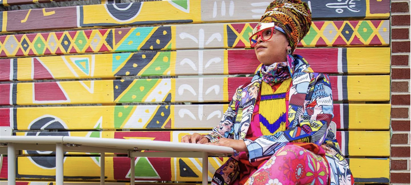 A vibrant picture of the performer Starfire, emcee of the Philadelphia Inquirer Food Festival, Happening November 15th, 2025 at the Fillmore.