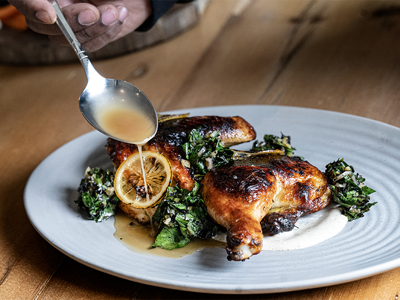 A plate of food representing the cuisine of the restaurant Honeysuckle a Philadelphia restaurant participating in the Philadelphia Inquirer Food festival, November 15th, 2025, at the Fillmore.